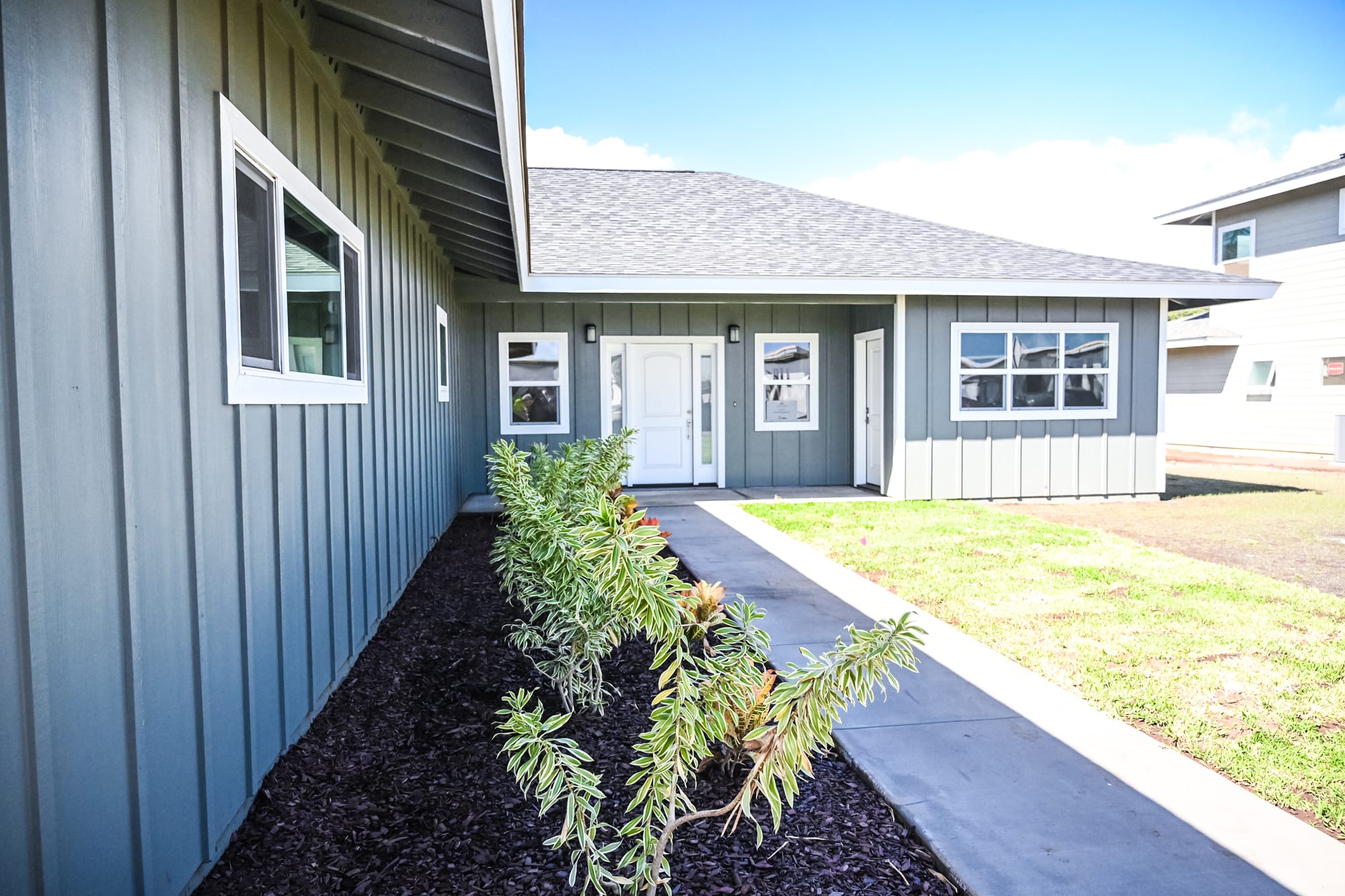 Front entrance and garden of a Housing for Healthcare home on Maui